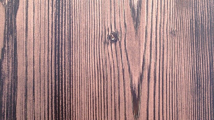 Holzmusterfläche in Kupfer
